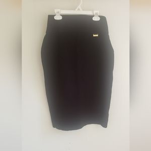 CALVIN KLEIN, black stretch skirt, size "S